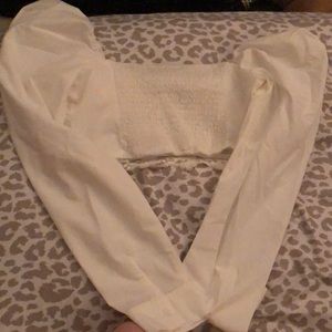 White ruffle long sleeved crop top.